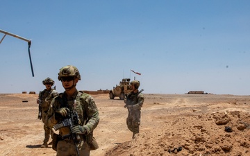 Coalition Forces meet with local civilian population