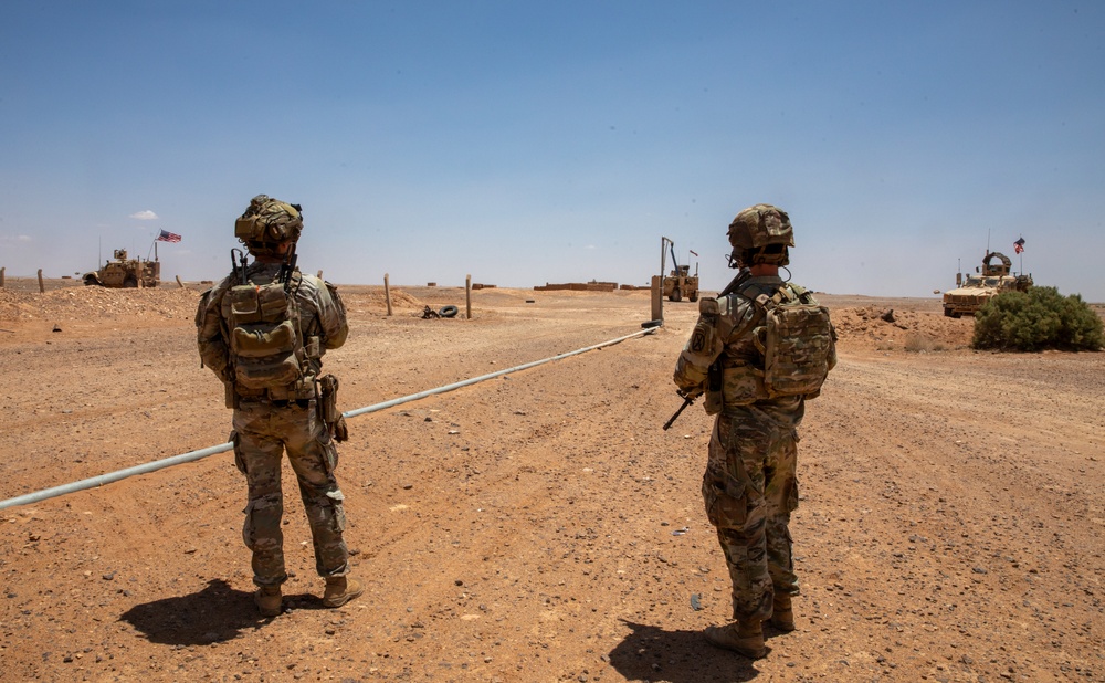 Coalition Forces meet with local civilian population