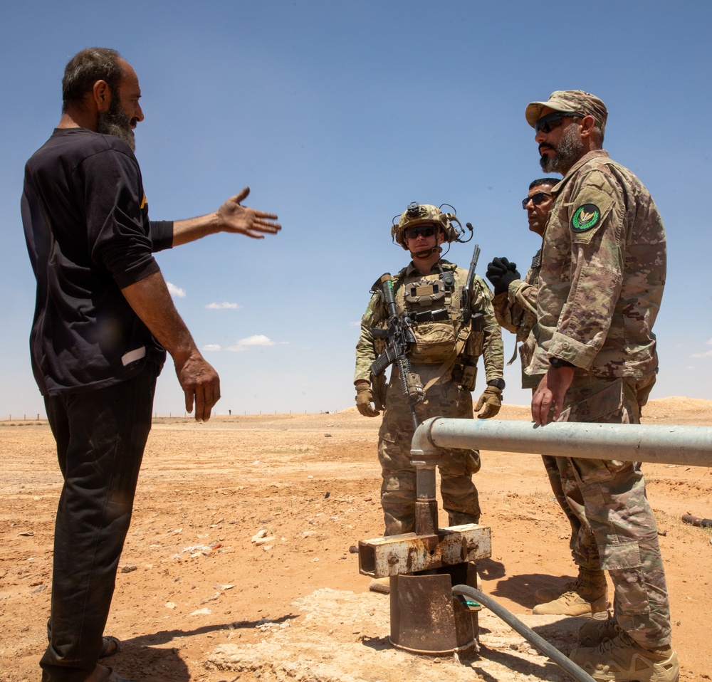 Coalition Forces meet with local civilian population