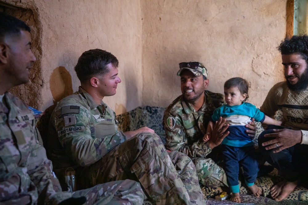 Coalition Forces meet with local civilian population