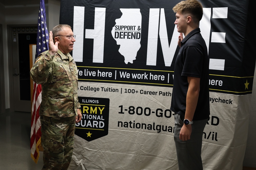 Col. Helfrich Swears In His Nephew