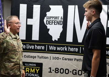 Col. Helfrich Swears In His Nephew