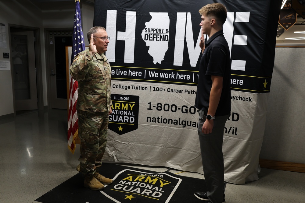Col. Helfrich Swears In His Nephew