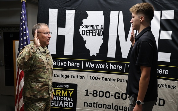 Col. Helfrich Swears In His Nephew