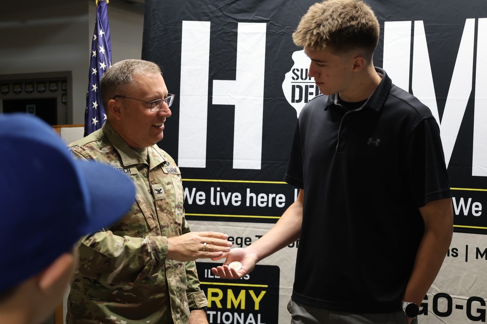 Col. Helfrich Swears In His Nephew