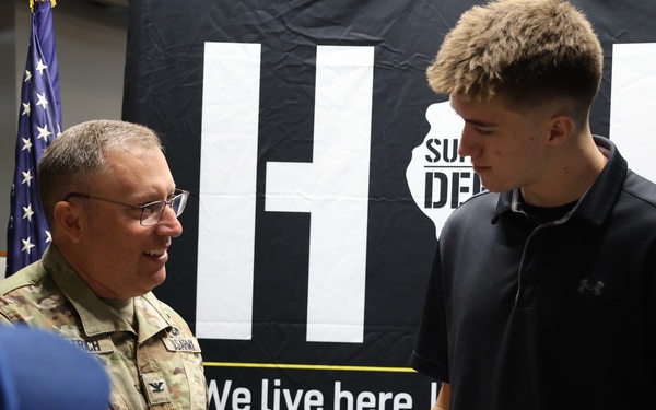 Col. Helfrich Swears In His Nephew