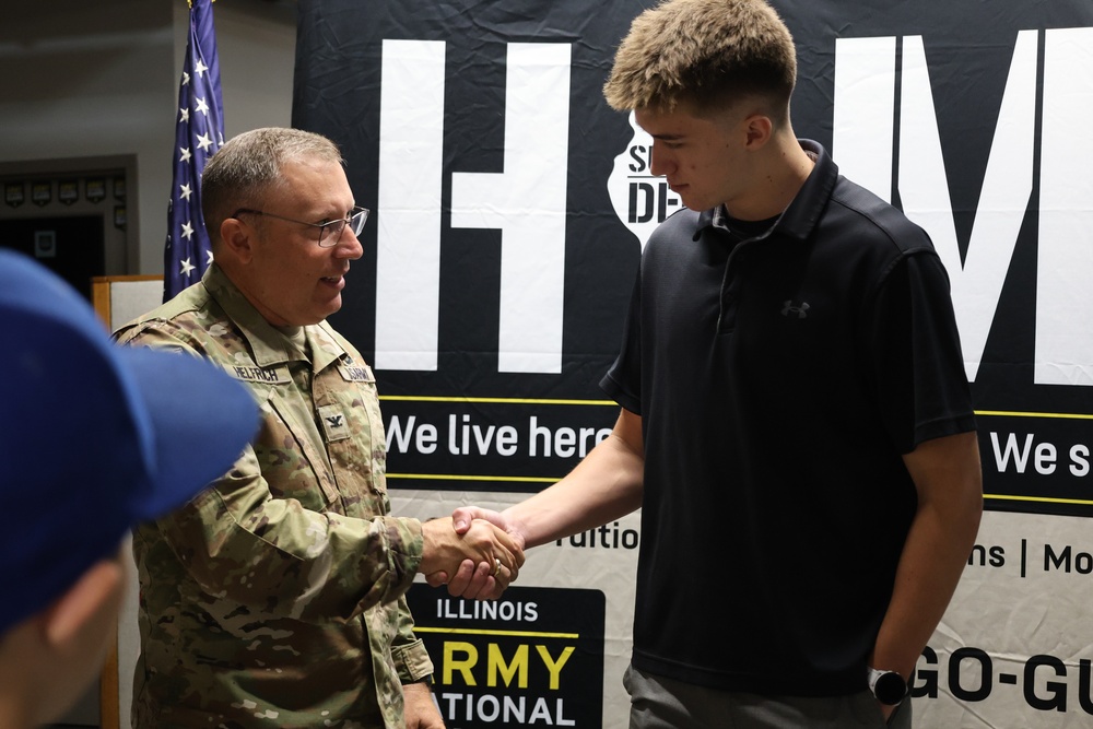 Col. Helfrich Swears In His Nephew