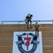 Rappelling with man's best teammate