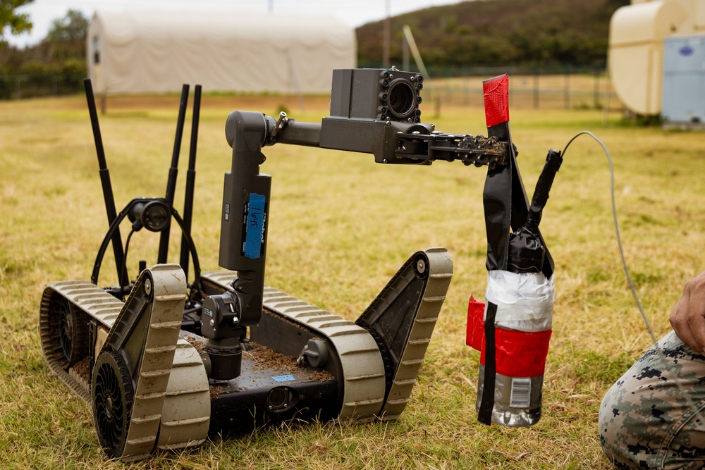 Robots on the prowl; 3d LLB EOD and HQBN EOD conduct a drop charge training exercise