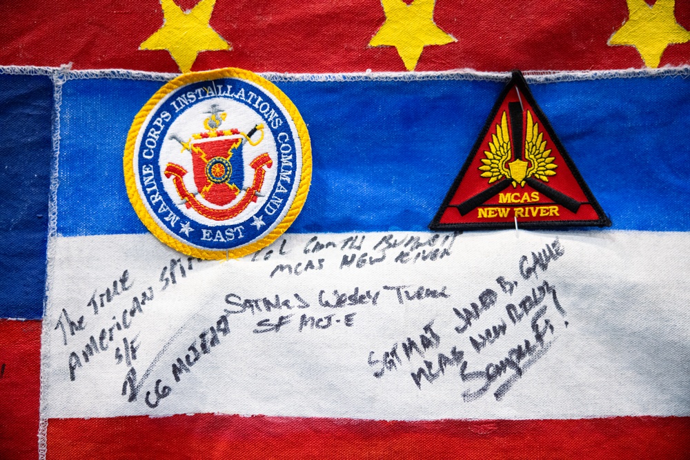 MCIEAST and MCAS New River Leaders Sign the 9/11 Memorial Flag