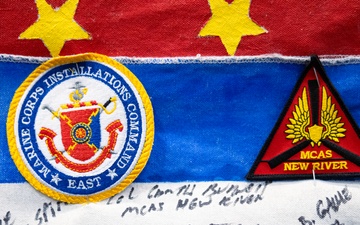 MCIEAST and MCAS New River Leaders Sign the 9/11 Memorial Flag