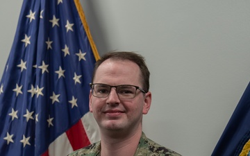 Navy Recruiter Poses For Portrait