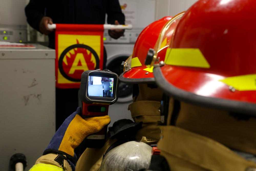 Sailors use the Naval Firefighting Thermal Imager