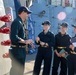 LTJG Brandon Sleik provides initial topside familiarization to Midshipman