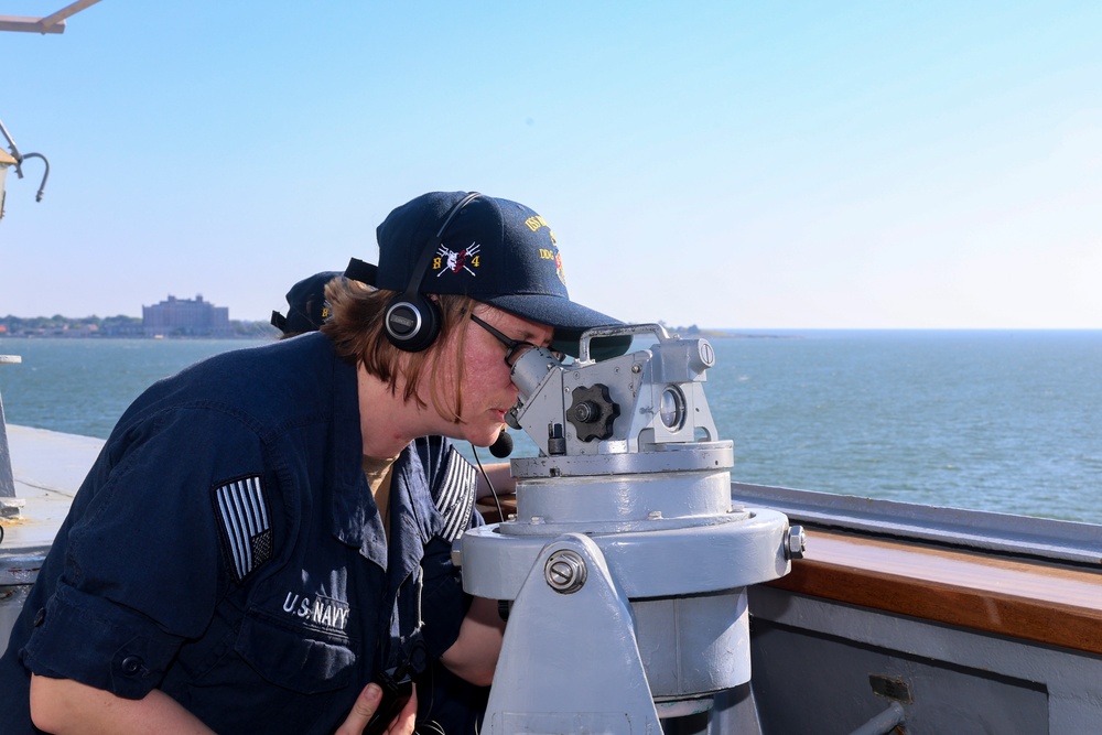 QMSN Lisa Gourlay uses an alidade to verify vector contact bearing