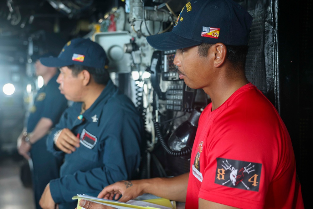 BMC Evandare Aganon and BM2 Kanim Hannigan conduct training on the bridge