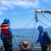 STGSN Nathan Antepara conduct final gear and safety checks