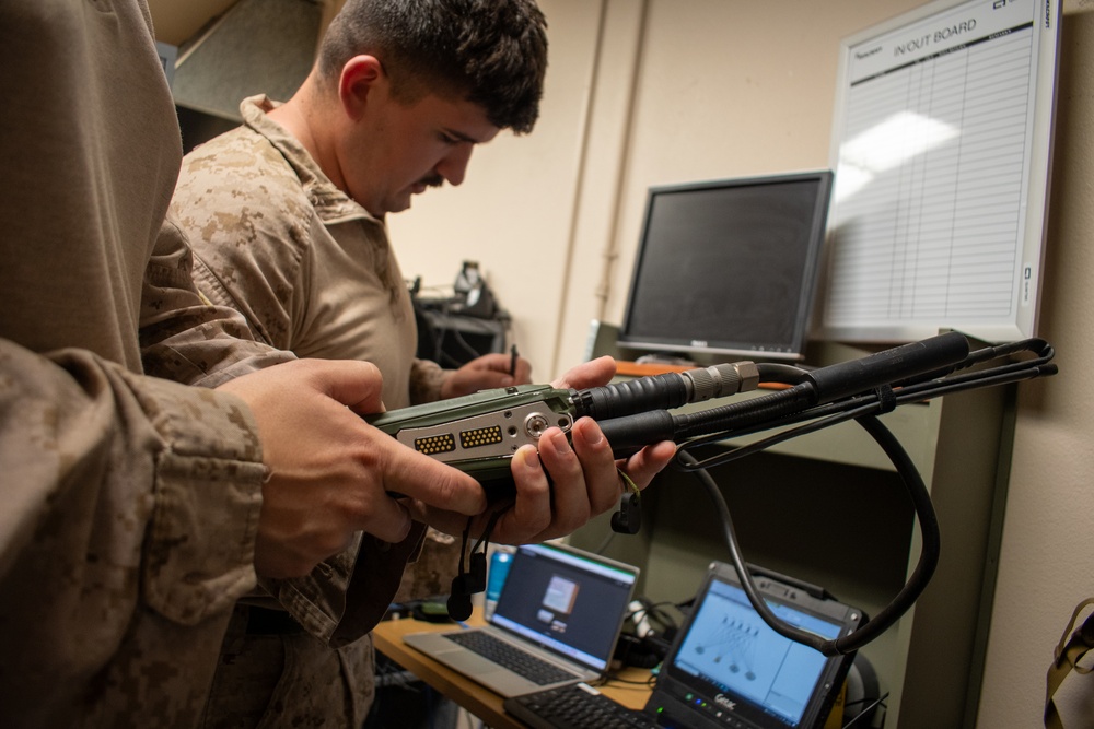 Task Force Sapper Marines check radio equipment supporting southern border operations