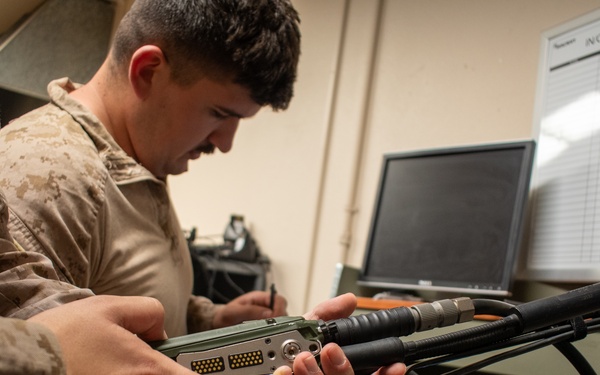 Task Force Sapper Marines check radio equipment supporting southern border operations