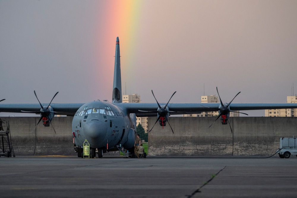 Rainbow arcs over the Yokota flightline