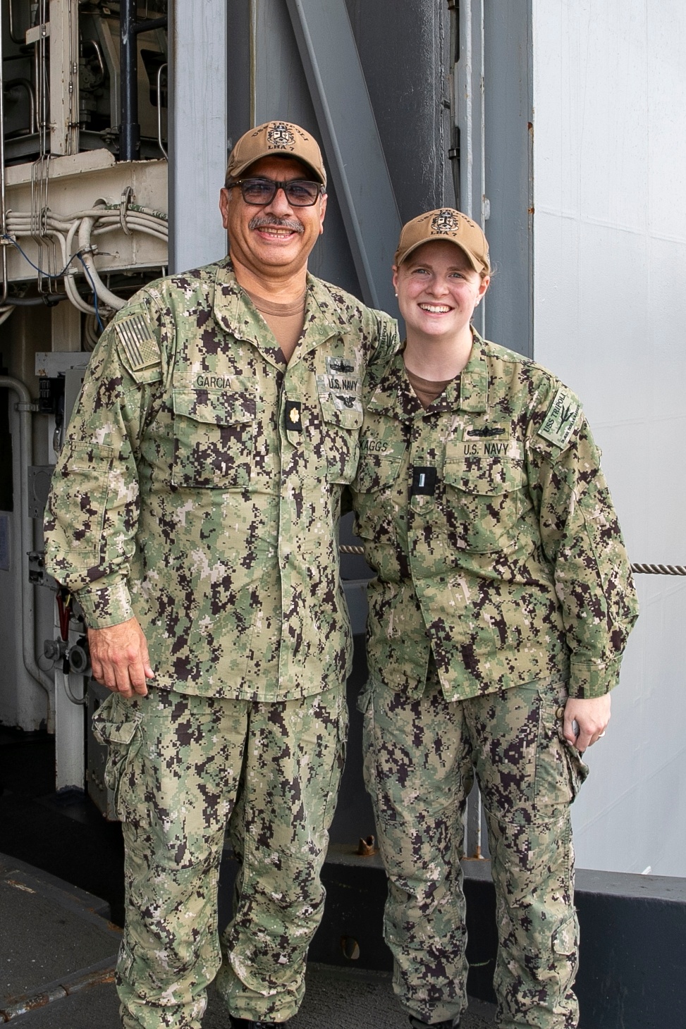 USS Tripoli’s Admin Officer and the G3 Divisional Officer are Piped Ashore
