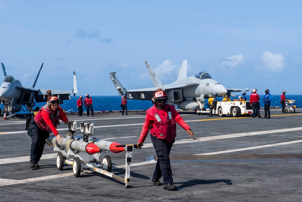 Nimitz Sailors Move Ordnance