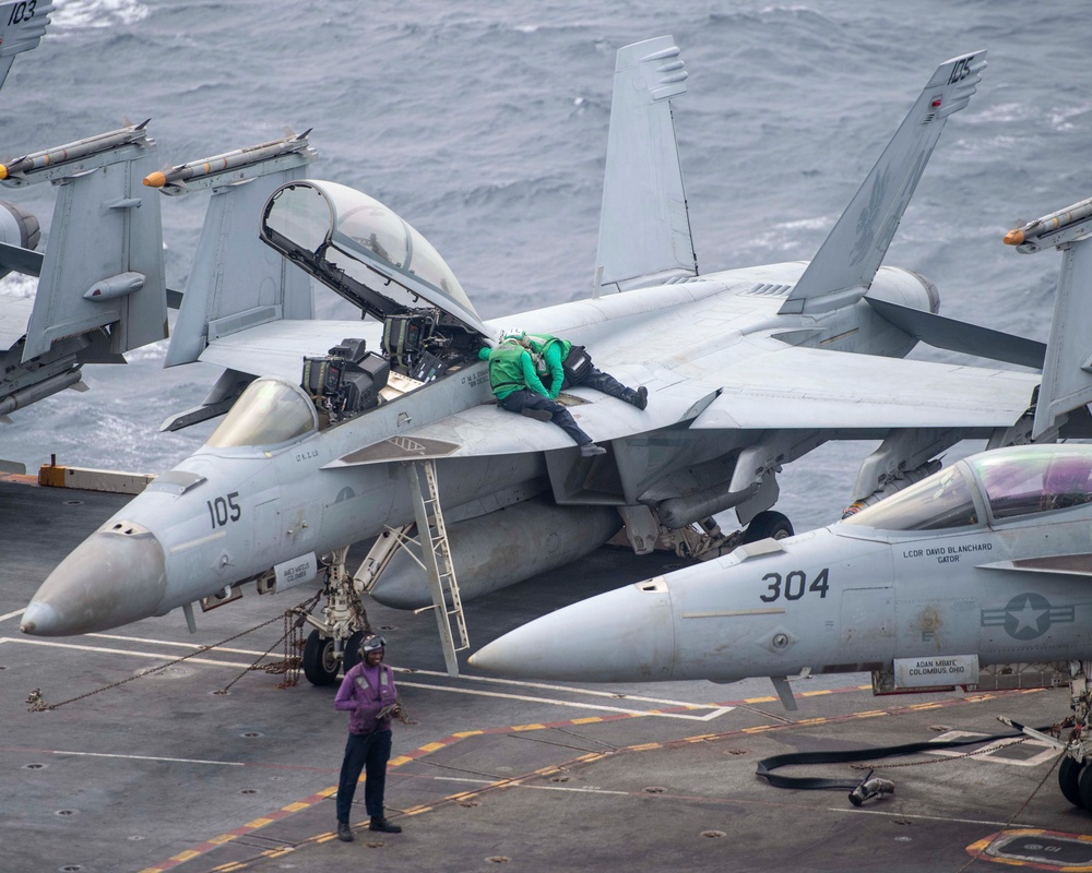 Nimitz Sailors Perform Maintenance on Aircraft
