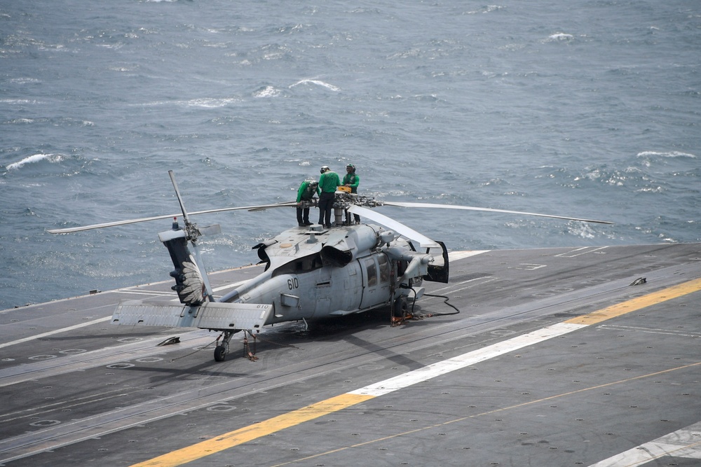 Nimitz Sailors Conduct Maintenance on Aircraft