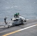 Nimitz Sailors Conduct Maintenance on Aircraft