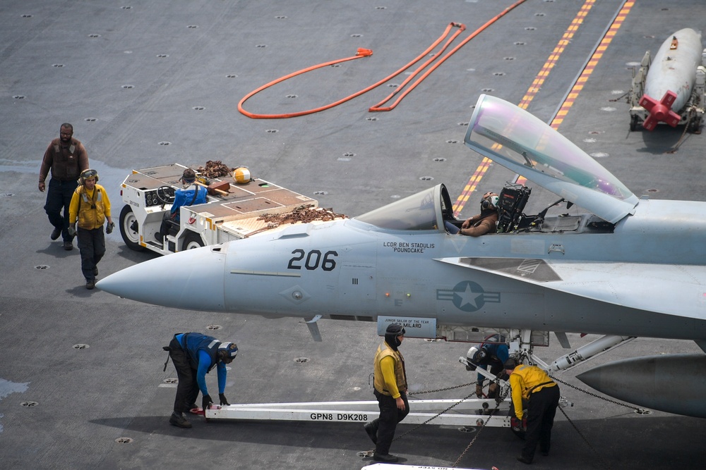 Nimitz Sailors Conduct Maintenance on Aircraft
