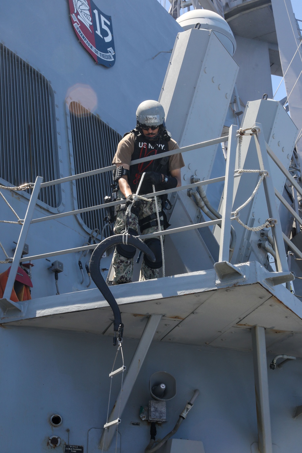 Sailors aboard the USS John Finn conduct a visit, board, search and seizure drill in the Philippine Sea
