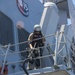 Sailors aboard the USS John Finn conduct a visit, board, search and seizure drill in the Philippine Sea