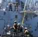 Sailors aboard the USS John Finn conduct a visit, board, search and seizure drill in the Philippine Sea