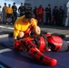 Sailors aboard the USS John Finn hold a security reaction force class in the Philippine Sea