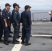 Sailors aboard the USS John Finn conduct a sea and anchor detail in Apra Harbor, Guam