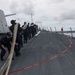 Sailors aboard the USS John Finn conduct a sea and anchor detail in Apra Harbor, Guam