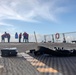 USS Ralph Johnson Sailors Participate in a Small Arms Weapons Qualification