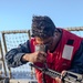 USS Ralph Johnson Sailors Participate in a Small Arms Weapons Qualification