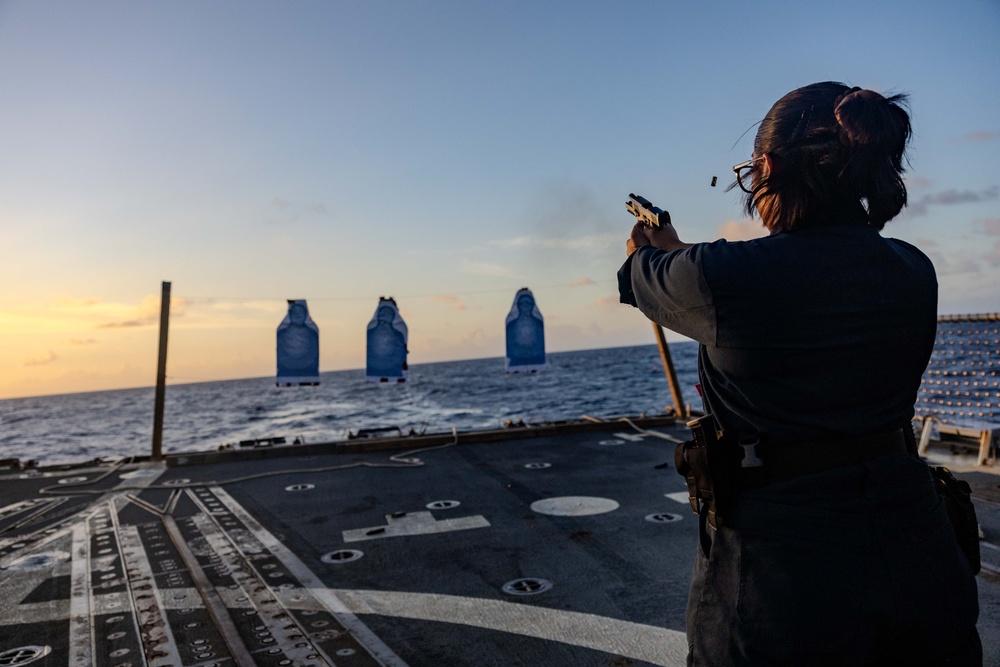 USS Ralph Johnson Sailors Participate in a Small Arms Weapons Qualification