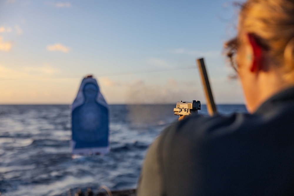 USS Ralph Johnson Sailors Participate in a Small Arms Weapons Qualification