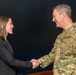 CJCS Gen. Caine greets and presents coins U.S. Africa Command team members