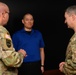 CJCS Gen. Caine greets and presents coins U.S. Africa Command team members