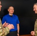 CJCS Gen. Caine greets and presents coins U.S. Africa Command team members