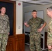 CJCS Gen. Caine greets and presents coins U.S. Africa Command team members