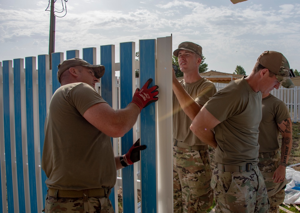134th CES build fences for base housing at Morón Air Base