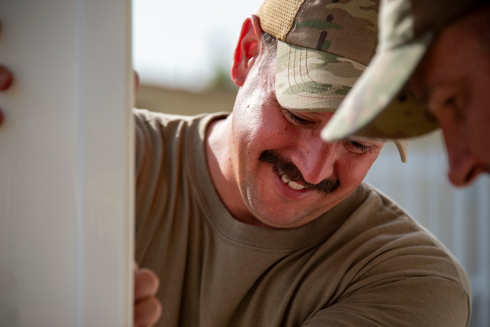 134th CES build fences for base housing at Morón Air Base