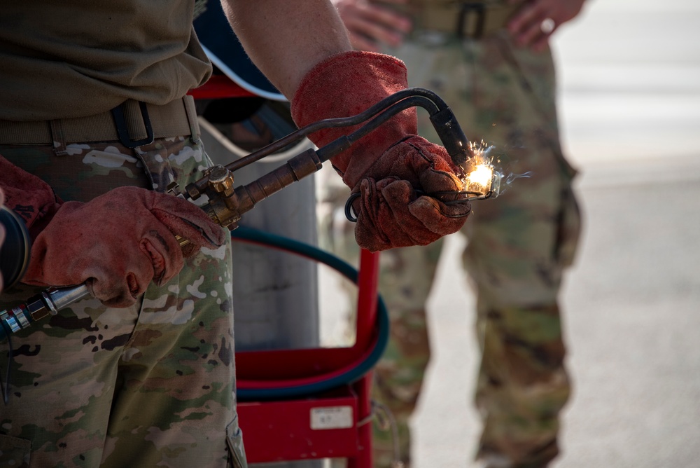 134th CES remove scale, lay concrete at Morón Air Base