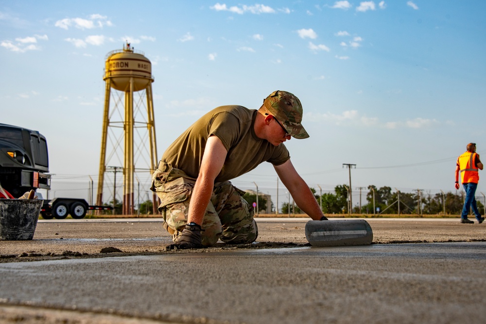 134th CES remove scale, lay concrete at Morón Air Base