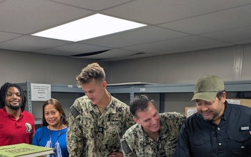 Capt. Bolls huddles with NAVSUP FLC Jacksonville Site NAS Key West staff