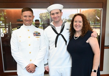 Commanding Officer Surface Combat Systems Training Command Great Lakes is the reviewing officer of Ron's boot camp graduation.